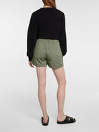Light beige women's drawstring shorts with pockets, featuring a minimalist design and casual fit from Trendy Attic Store01.