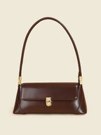 Urban solid leather shoulder bag by Plush Fashion Hub featuring a minimalist zip-up design and crossbody style.