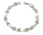 Vintage cubic zirconia sandals and flowers sterling silver bracelet with intricate designs, jewelry accessory from Plush Fashion Hub