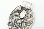 Vintage Danecraft floral panels sterling silver bracelet with intricate floral designs, jewelry accessory from Plush Fashion Hub