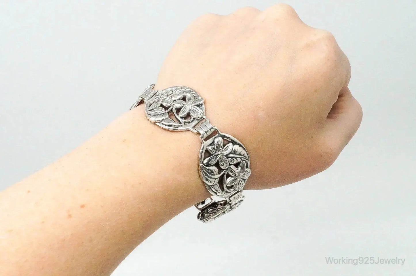 Vintage Danecraft sterling silver floral panels bracelet with intricate floral design, jewelry accessory, stylish and elegant.