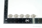Vintage Danecraft sterling silver bracelet with floral panel design, featuring intricate craftsmanship and timeless jewelry style.