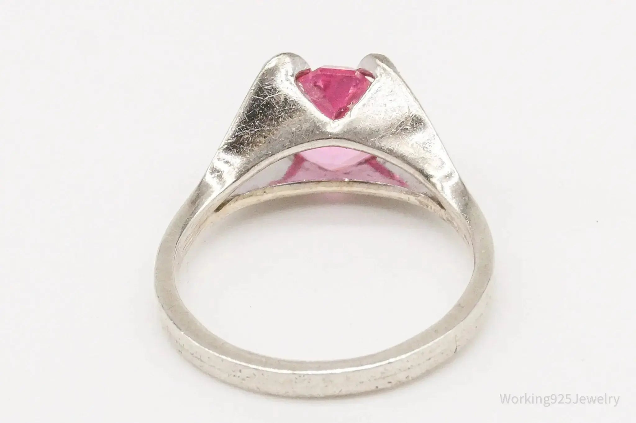 Vintage Espo pink cubic zirconia sterling silver ring in size 5, jewelry accessory with elegant design and sparkling stones.