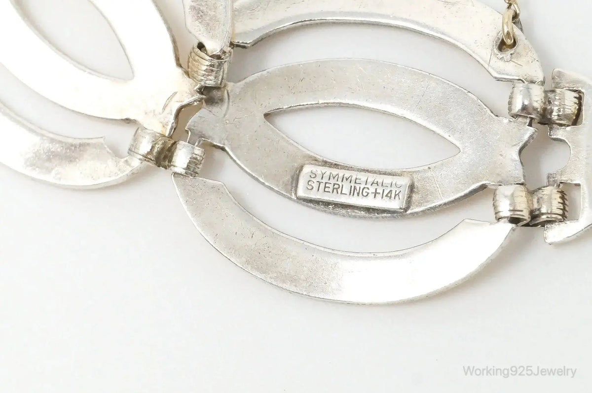 Vintage silver and 14K gold Art Deco bracelet with symmetrical design, crafted by Plush Fashion Hub.
