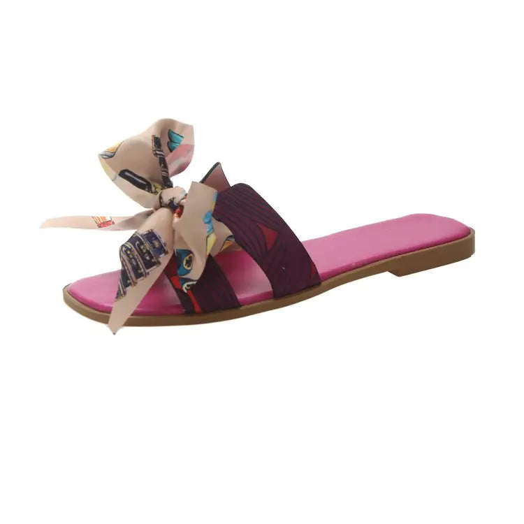 Women's summer flat slippers with bow detail, stylish and comfortable women's sandals by Trendy Attic Store01.