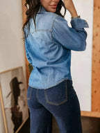 Washed cotton blend denim button-down shirt for women by Trendsi, showing the casual fit and classic collar detail.