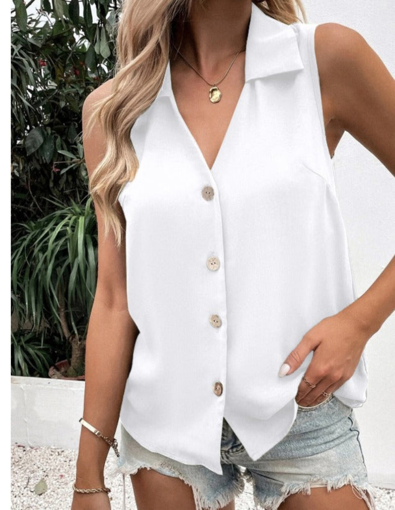 Women's sleeveless loose vest top with button details in solid color, casualwear by Plush Fashion Hub, displayed on a model.