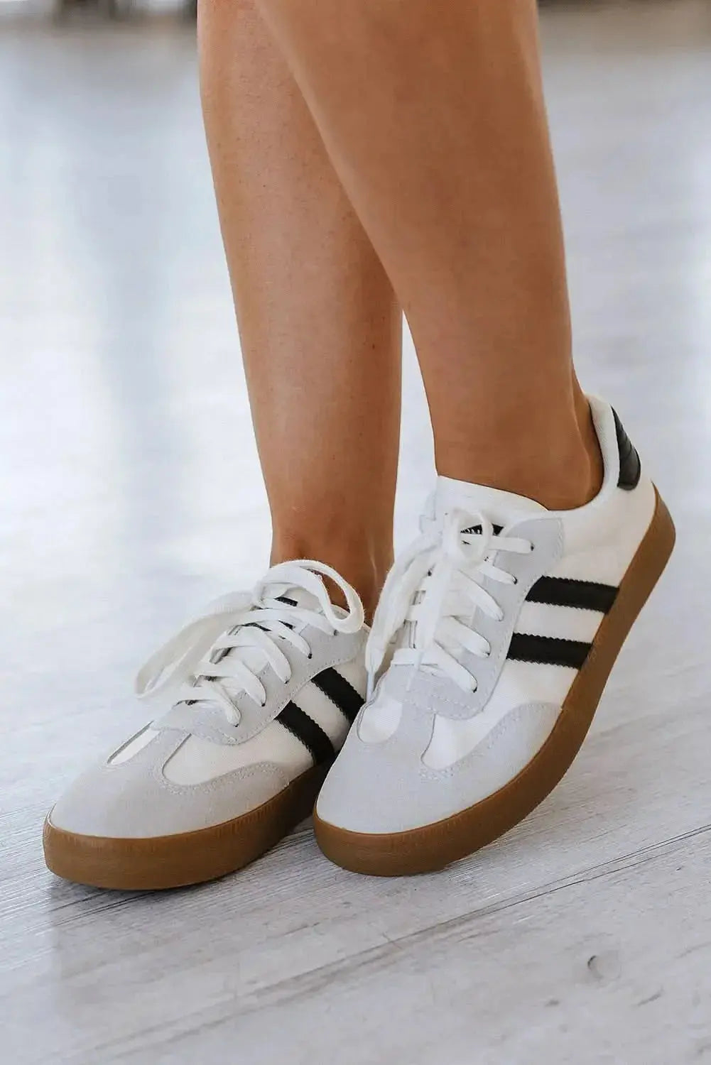 Women's white striped lace-up sneakers by Plush Fashion Hub, casual flat walking shoes for everyday comfort.