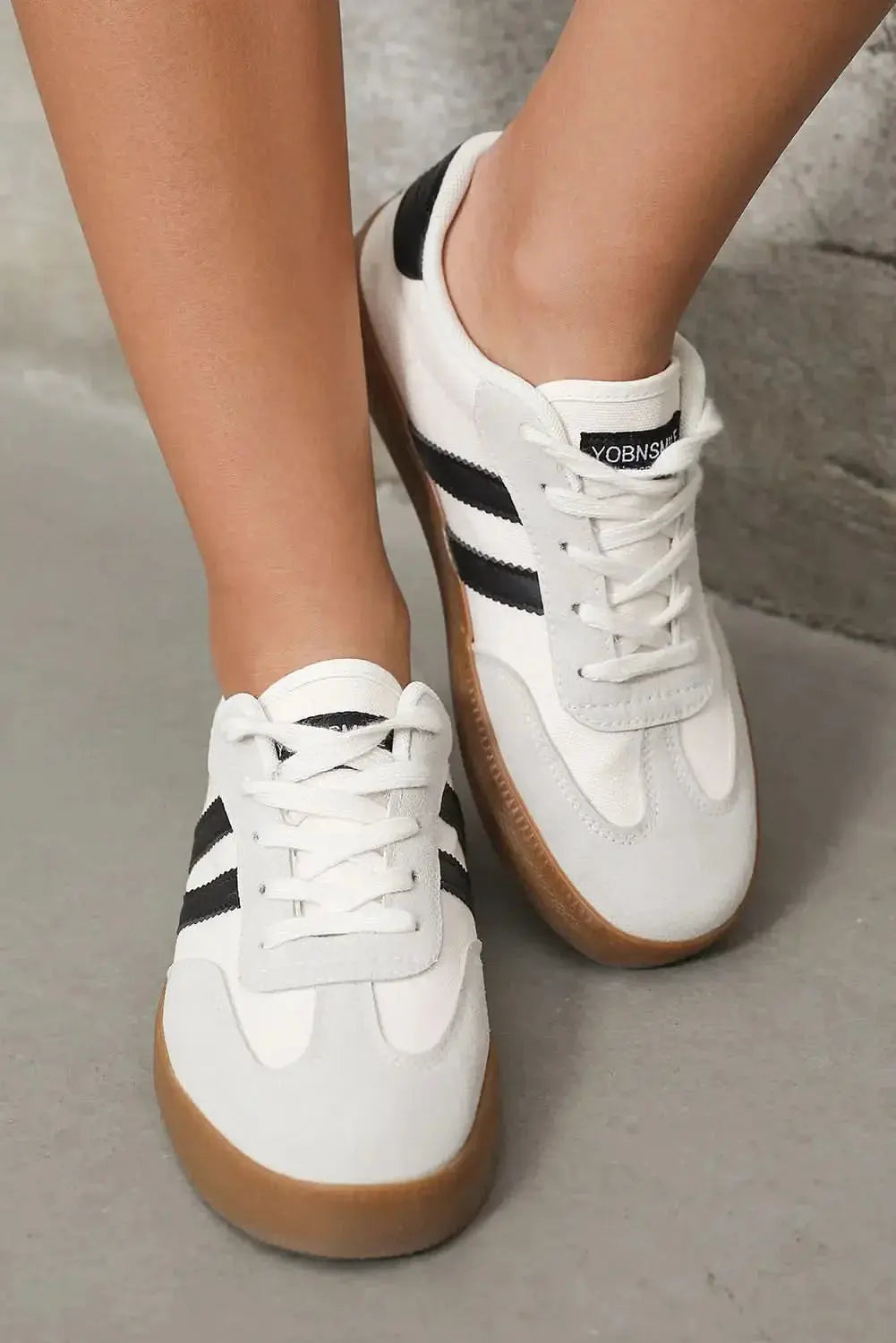White striped women's sneakers with lace-up design from Plush Fashion Hub, perfect for casual walking and everyday comfort.
