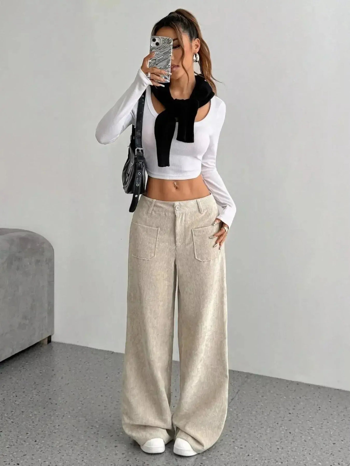Women's high-waisted wide-leg corduroy pants by Plush Fashion Hub, shown in a stylish view highlighting the relaxed fit and textured fabric.
