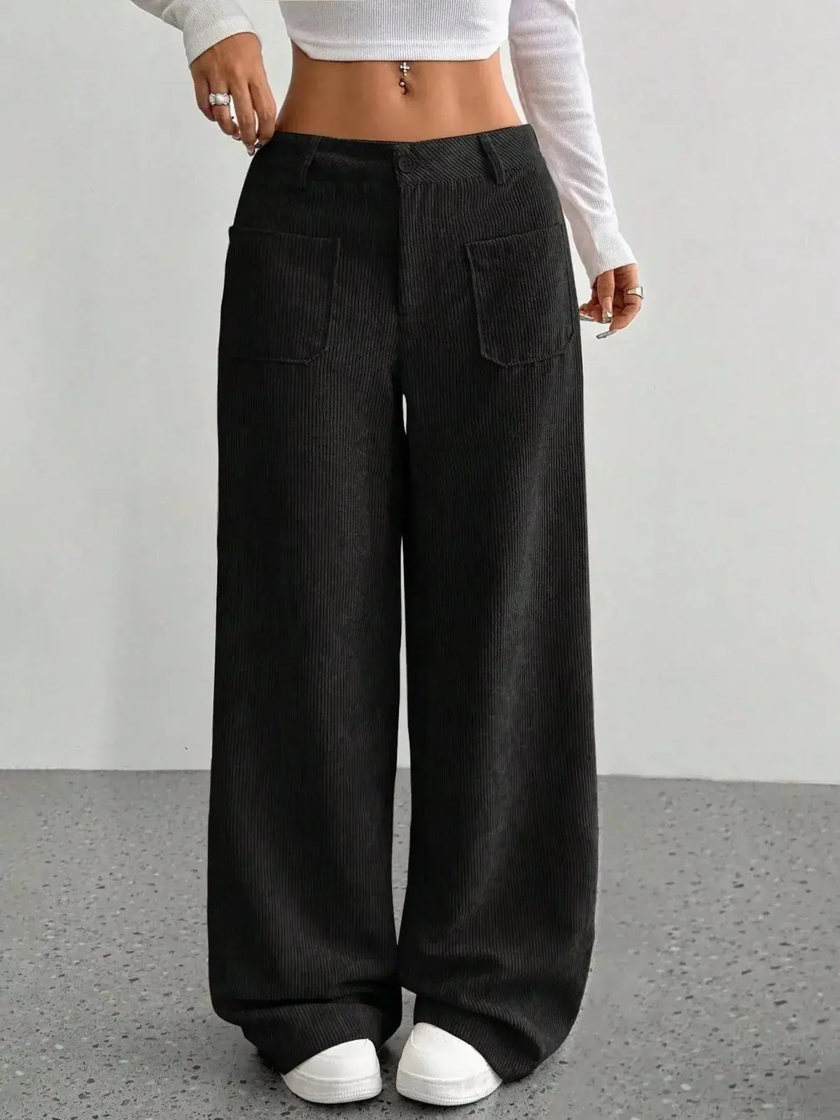 Women’s high-waisted wide-leg corduroy trousers by Plush Fashion Hub, shown in a soft brown color with a relaxed fit.