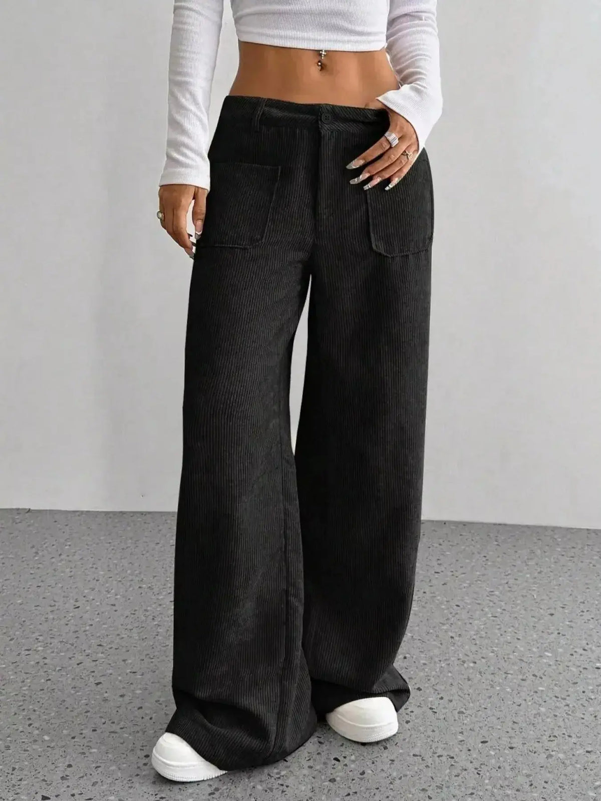 Women's high-waisted wide-leg corduroy pants by Plush Fashion Hub, featuring a stylish and comfortable fit with a textured fabric.