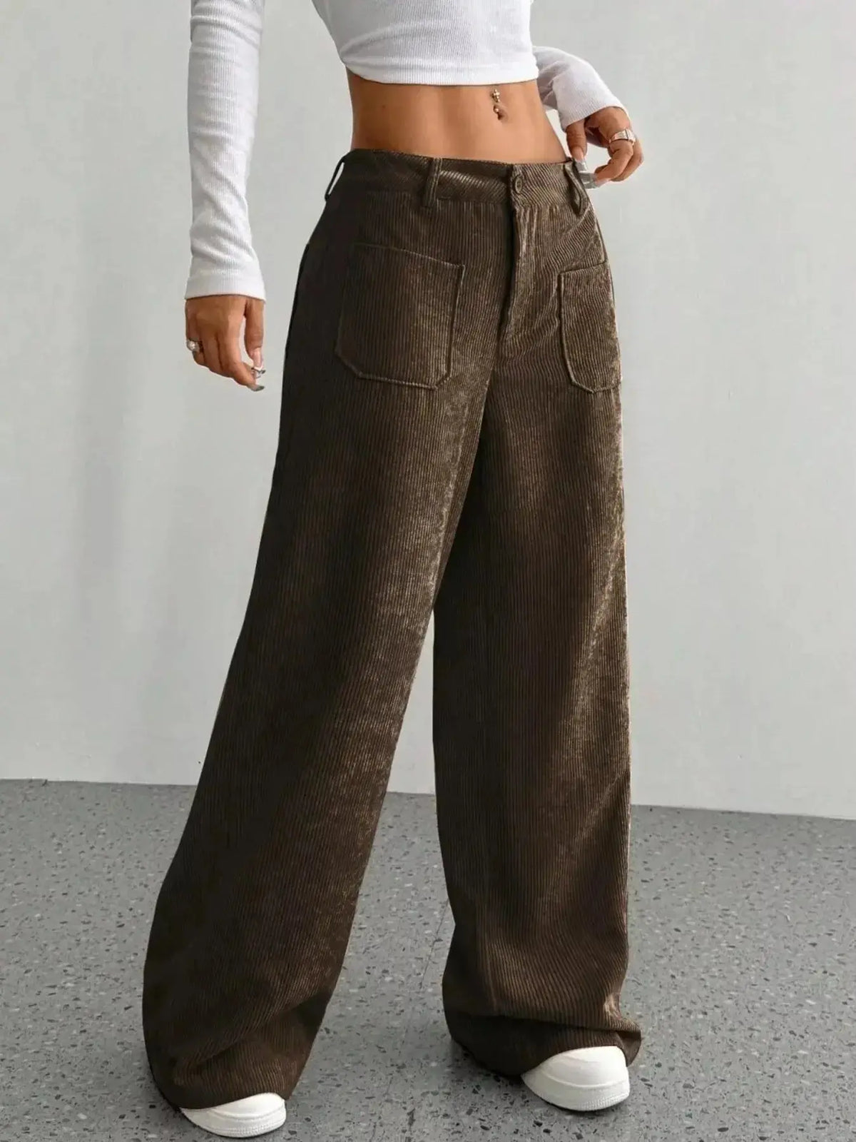 Women's high-waisted wide-leg corduroy trousers by Plush Fashion Hub, showing the textured fabric and relaxed fit.