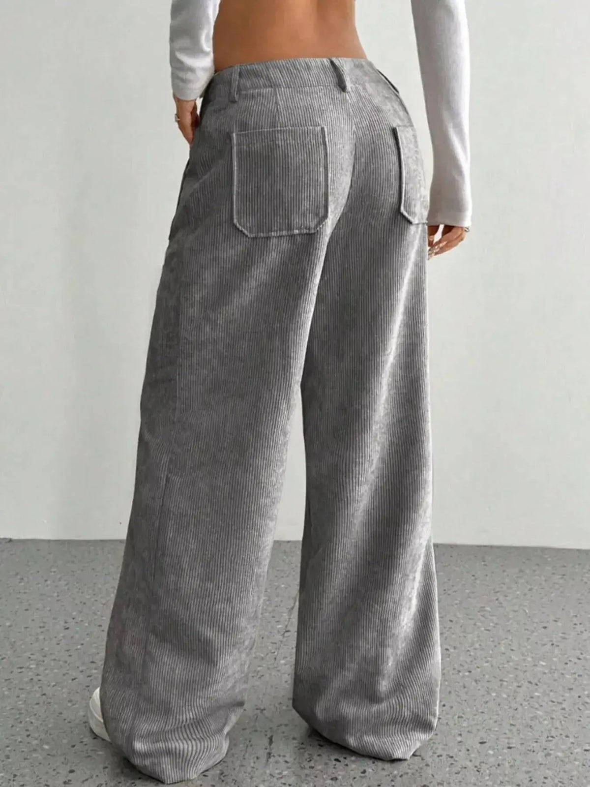 Women's high-waisted wide-leg corduroy trousers from Plush Fashion Hub, shown in a stylish beige color with a relaxed fit.