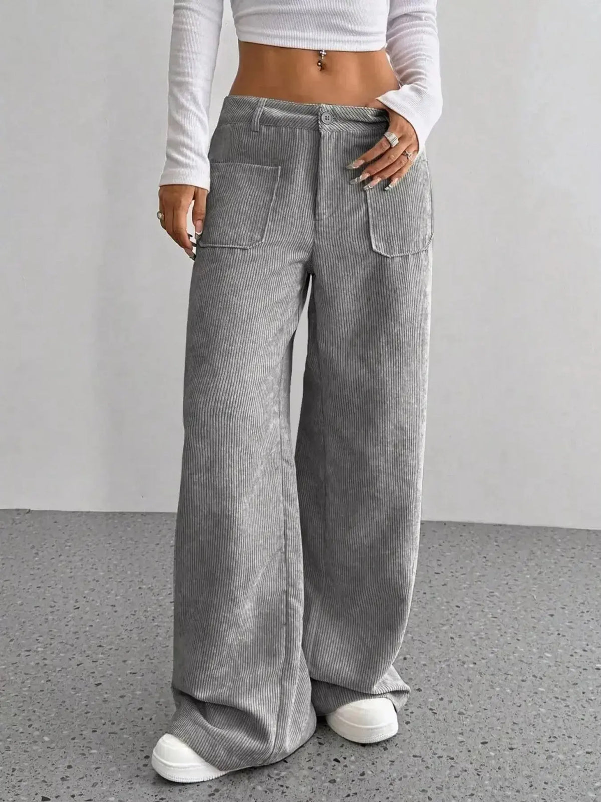 Women's high-waisted wide-leg corduroy trousers by Plush Fashion Hub, showcasing the textured fabric and relaxed fit.
