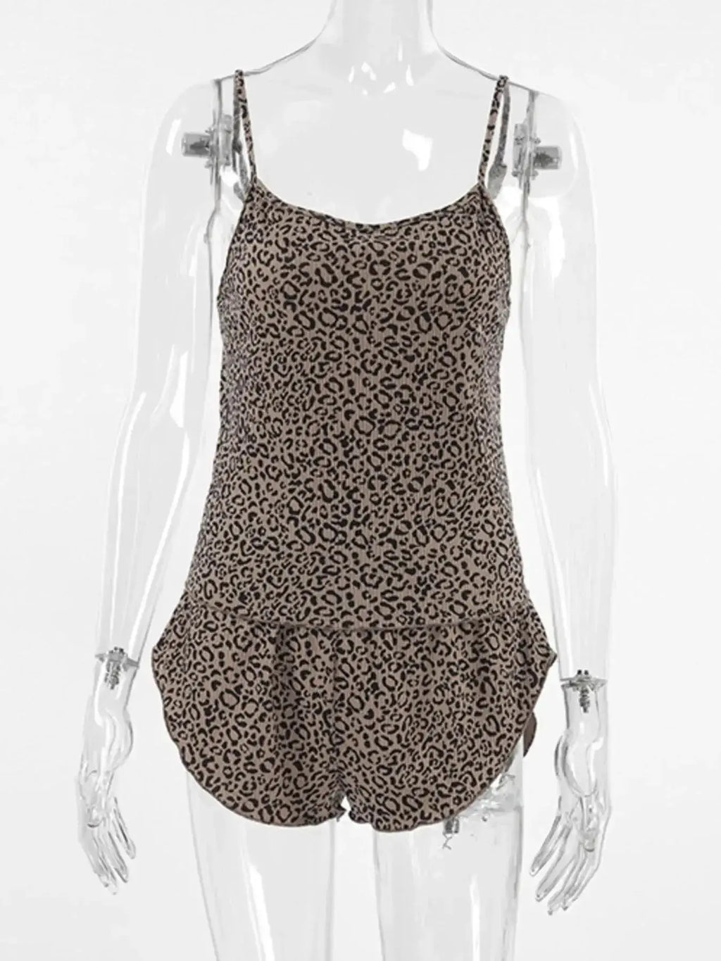 Women's leopard print pajama lounge set with cami, shorts, and cardigan by Trendsi, featuring a stylish and comfortable sleepwear ensemble.