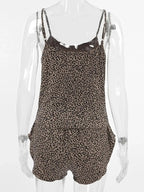Women's leopard print pajama lounge set with cami, shorts, and cardigan by Trendsi, featuring a stylish and comfortable sleepwear ensemble.
