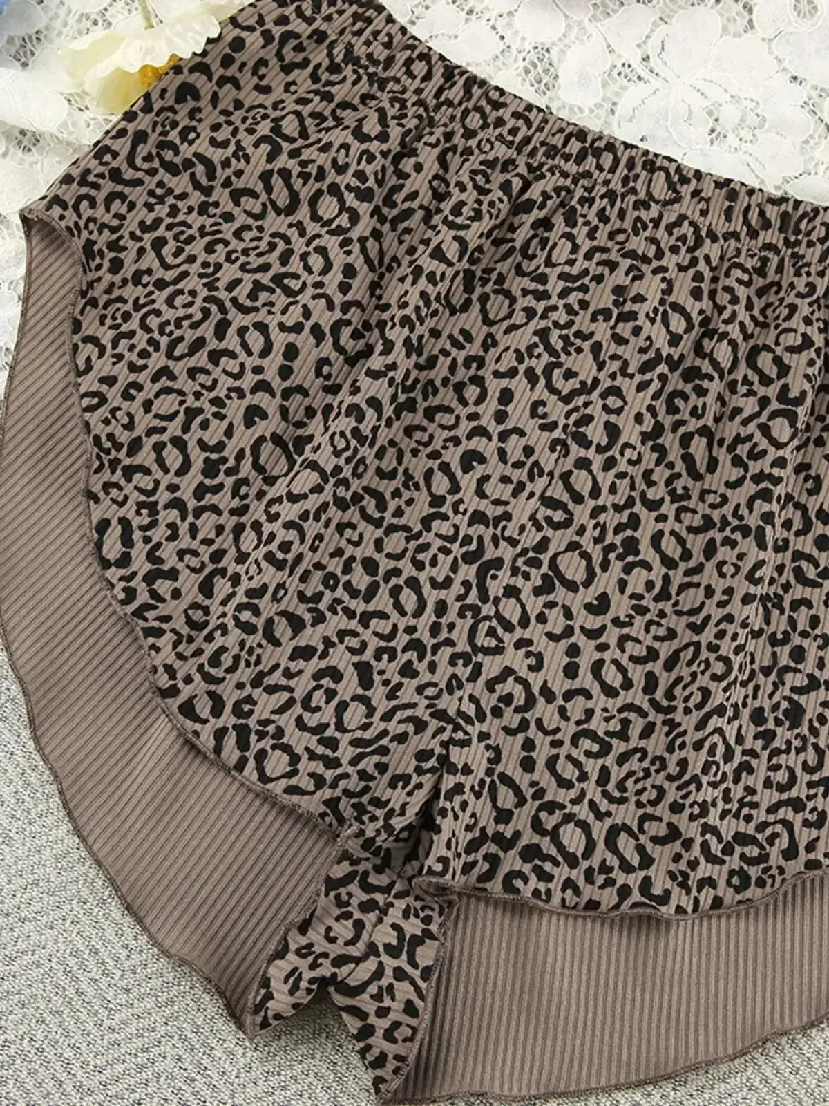 Women's leopard print 3-piece pajama lounge set with cami, shorts, and cardigan by Plush Fashion Hub, styled for comfort and casual wear.