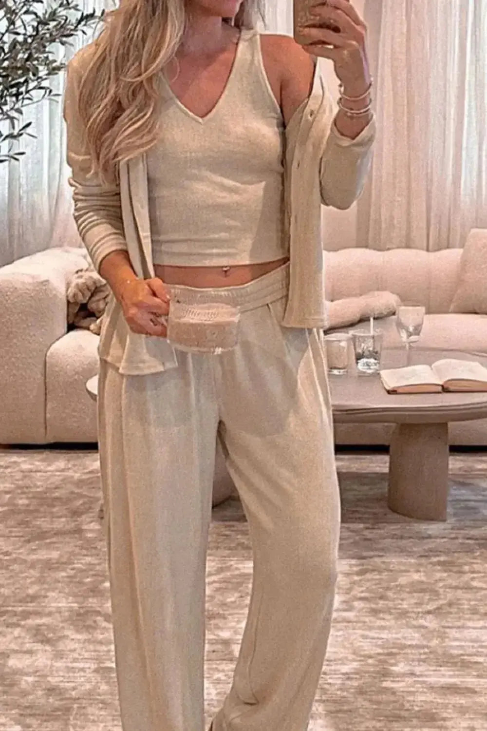 Women's 3-piece pajama set with V-neck tank, cardigan, and lounge pants by Trendsi, featuring comfortable, stylish sleepwear.