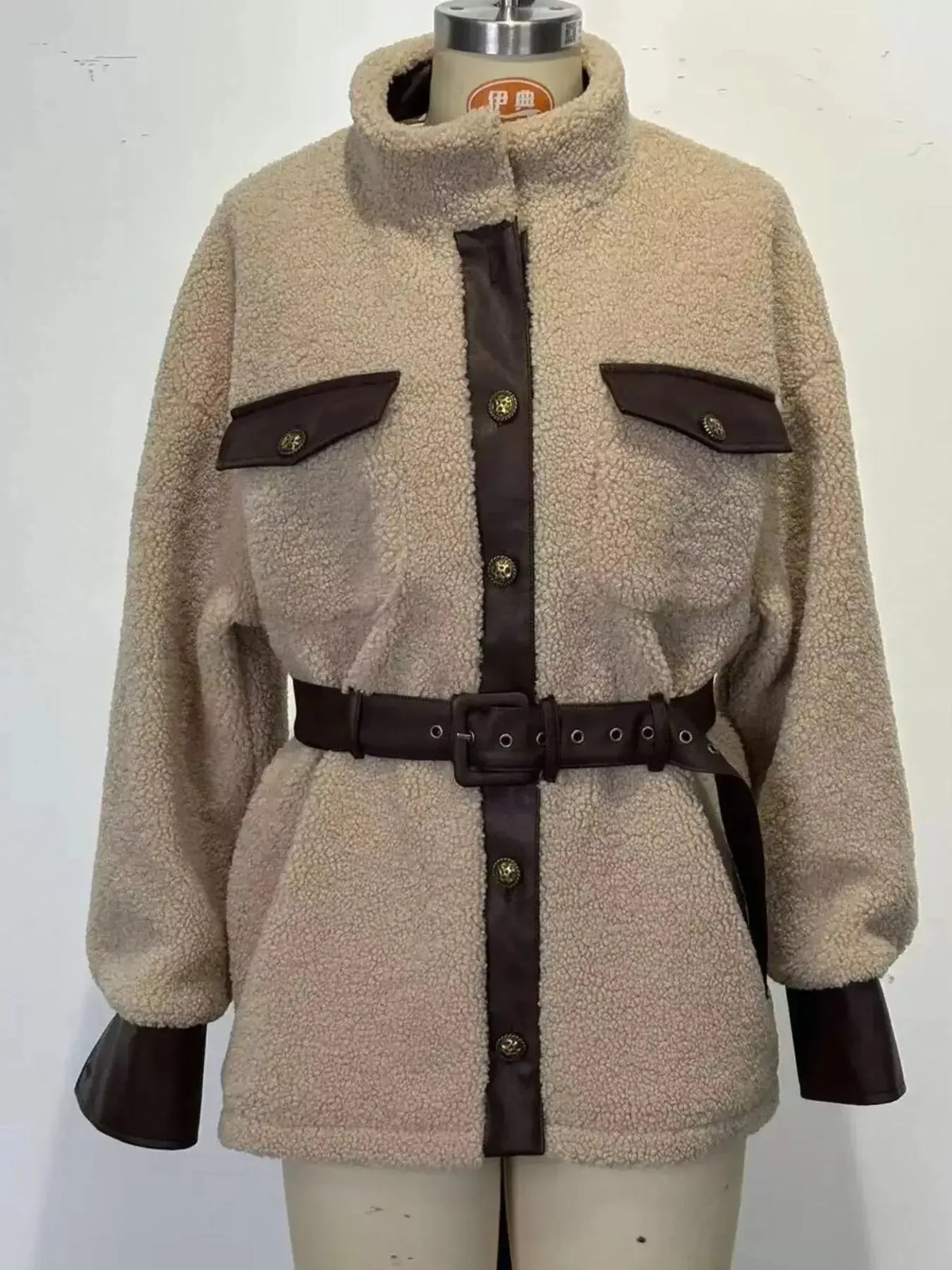 Women’s belted Sherpa jacket with leather trim by Plush Fashion Hub, featuring cozy fleece and stylish leather accents.
