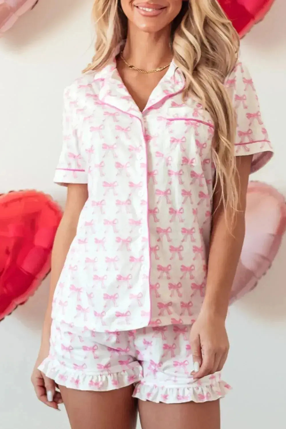 Women’s bow detail pajama lounge set with soft polyester shorts and shirt, featuring a relaxed fit and comfortable design.