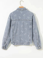 Women’s light wash denim jacket with bow knot print and raw hem, stylish casual denim jacket by Trendsi.