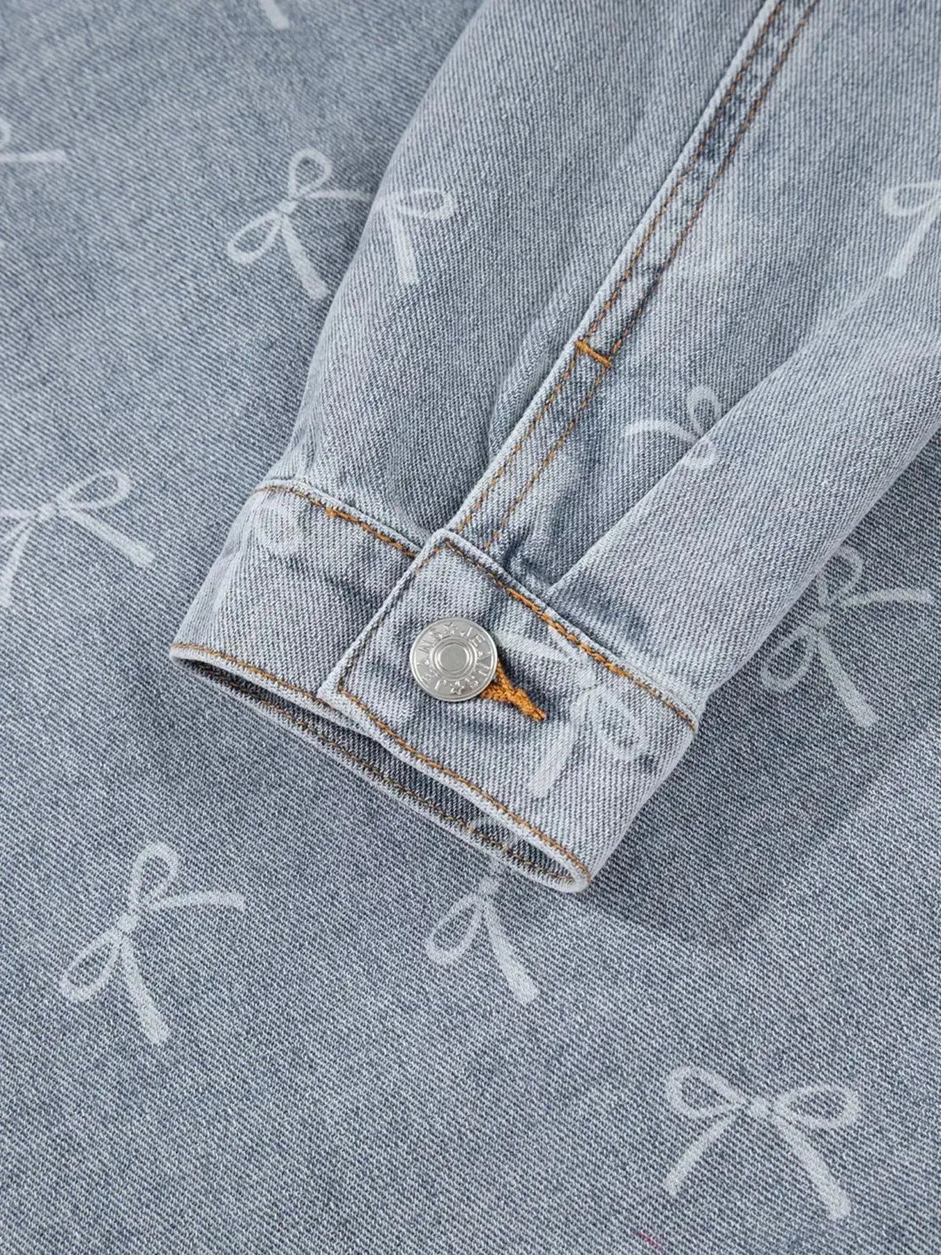 Light wash raw hem denim jacket with bow knot print for women, stylish trendy denim jacket from Trendsi.