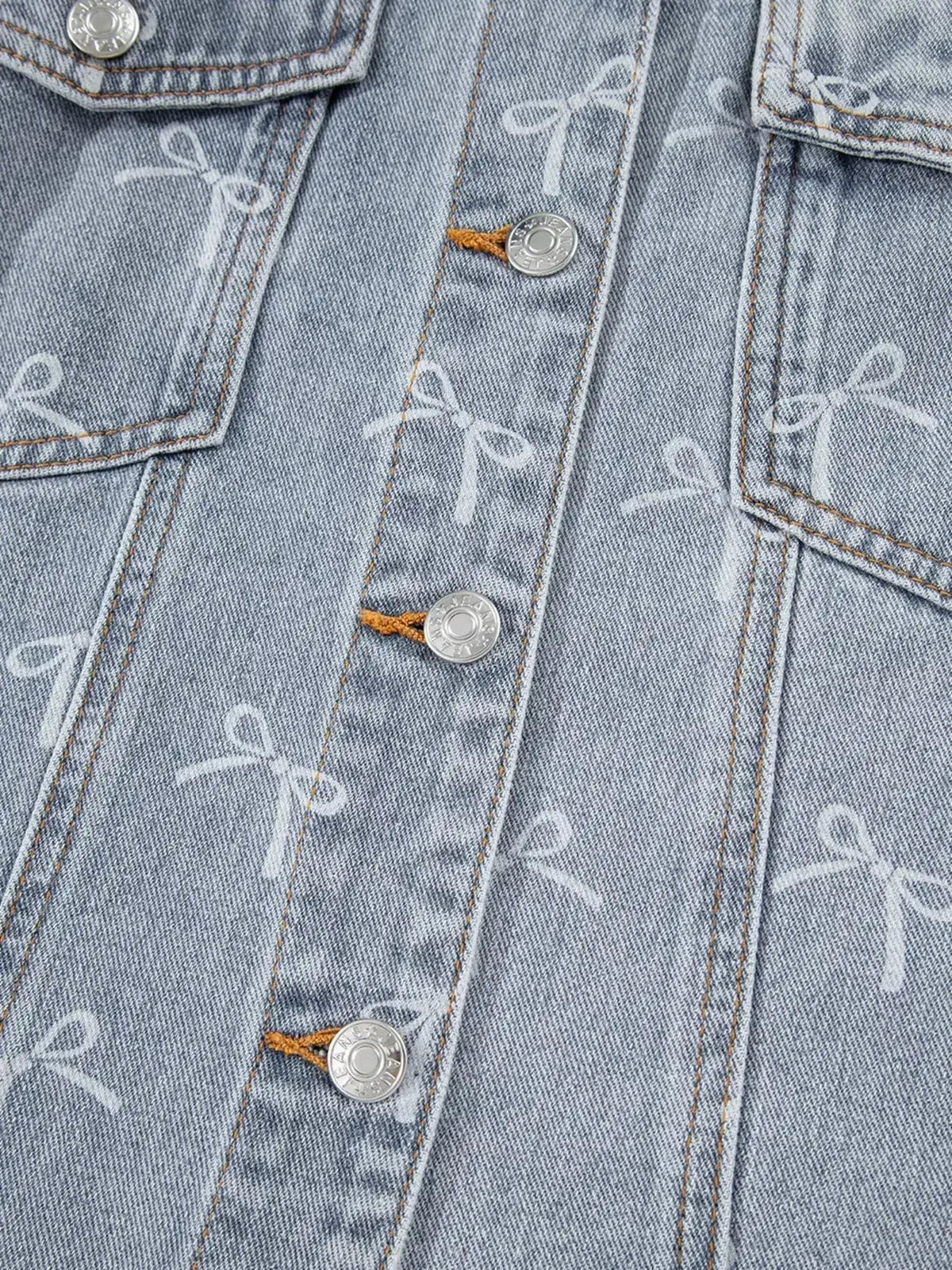 Women’s light wash denim jacket with bow knot print and raw hem, stylish plush fashion hub denim jacket for casual wear.