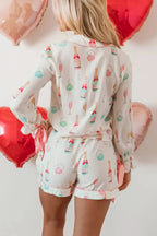 Women’s bow print collared lounge top and drawstring shorts pajama set by Trendsi, comfortable sleepwear for women.
