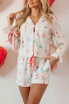 Women's bow print collared lounge top and drawstring shorts pajama set by Trendsi, comfortable sleepwear for women.