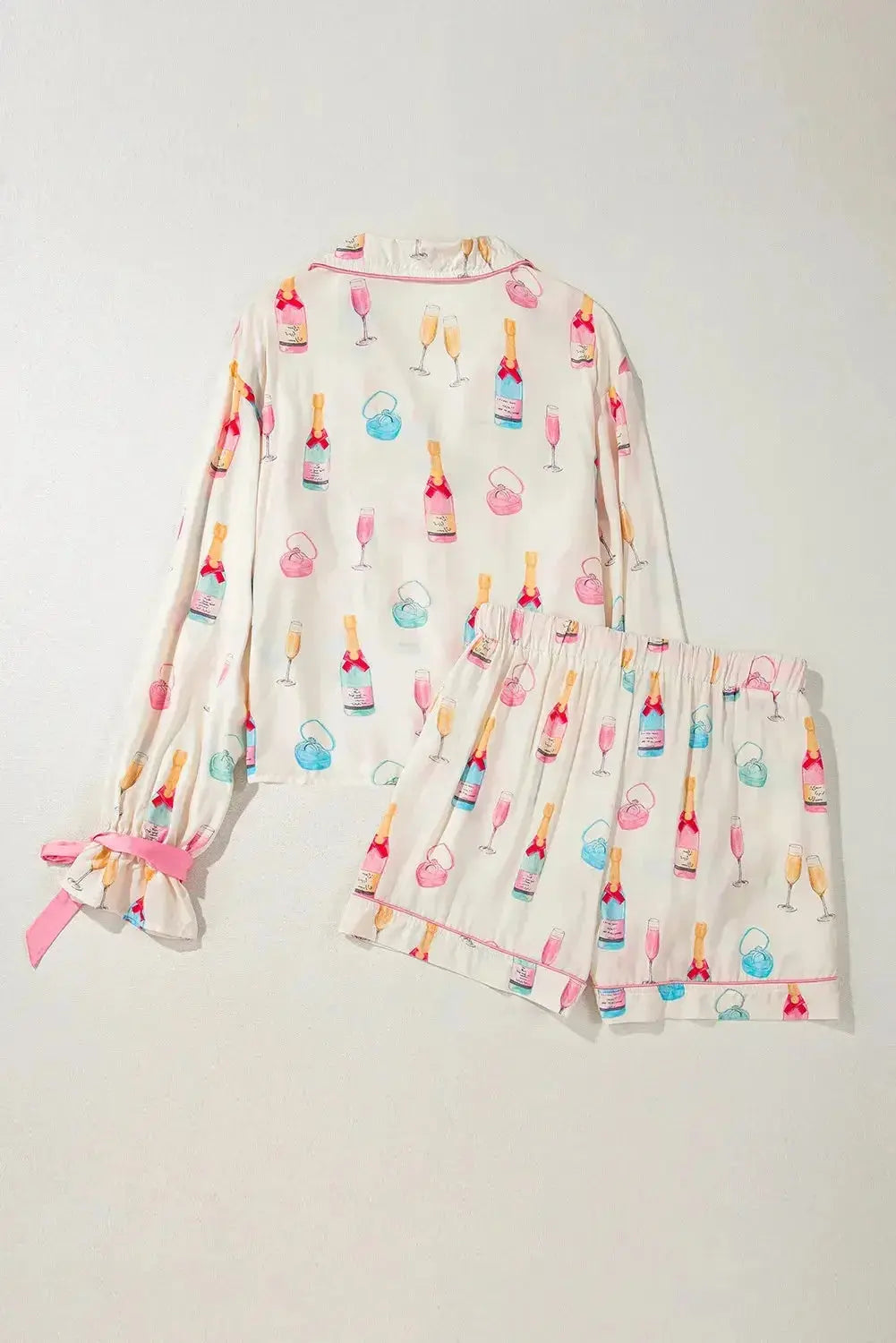 Women's bow print collared lounge top and drawstring shorts pajama set by Plush Fashion Hub, comfortable sleepwear for women.