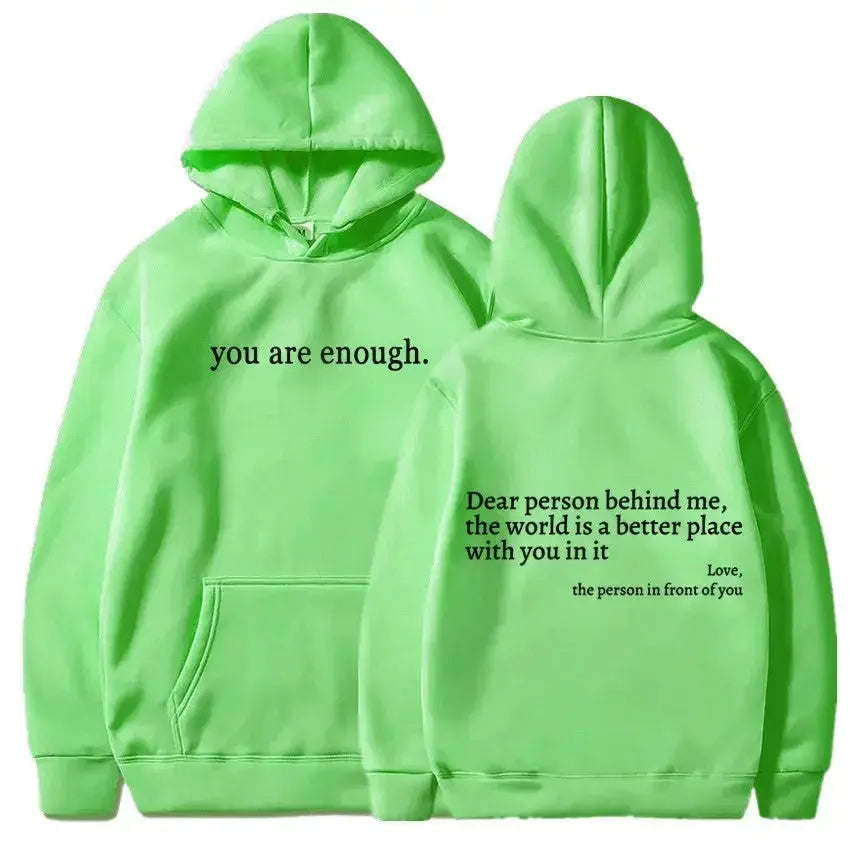 Women’s brushed fleece hoodie with letter graphic, soft oversized pullover by Plush Fashion Hub, front view showing cozy design.