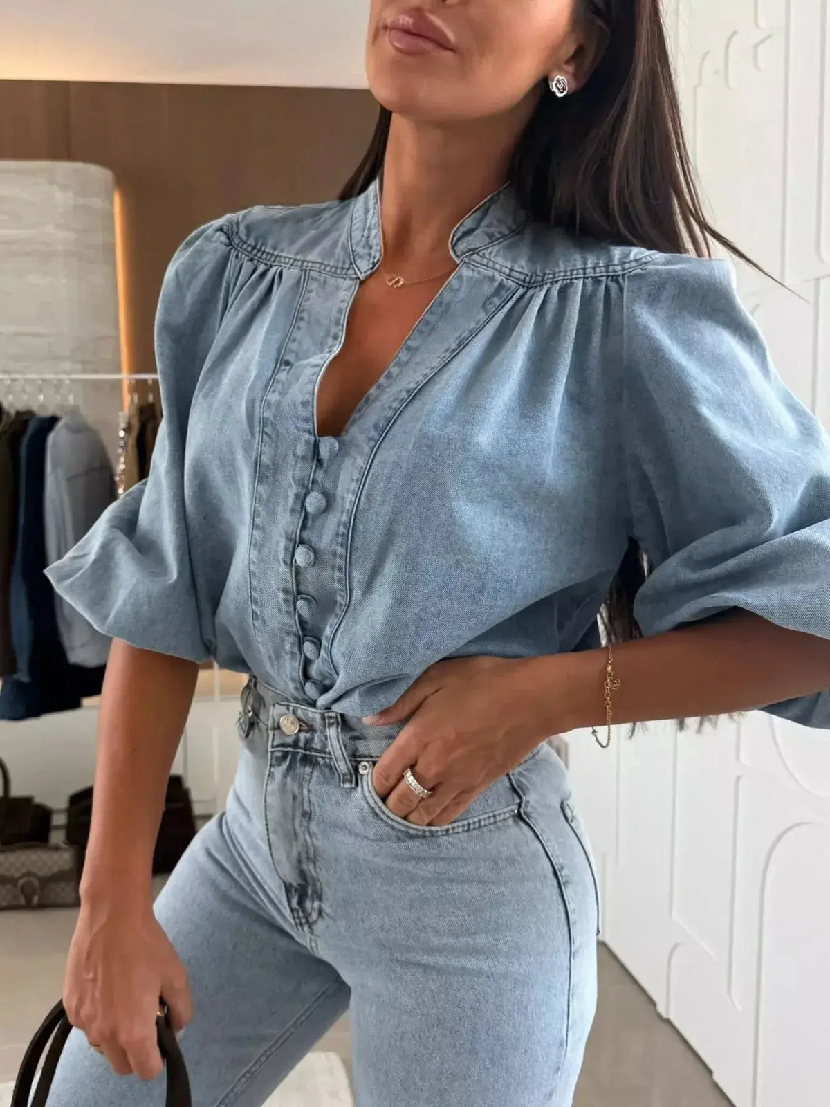 Women’s blue denim button-down blouse with puff sleeves, structured casual chic style from Plush Fashion Hub.