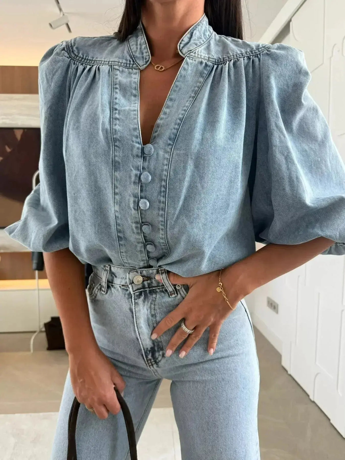 Women’s blue denim button-down blouse with puff sleeves and structured casual chic style by Plush Fashion Hub.