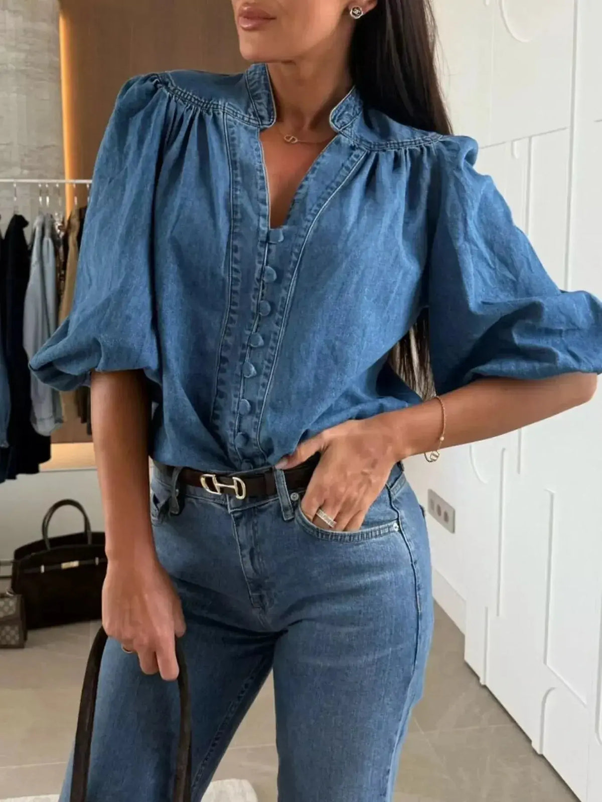 Women’s blue denim button-down blouse with puff sleeves, structured casual chic style by Plush Fashion Hub.