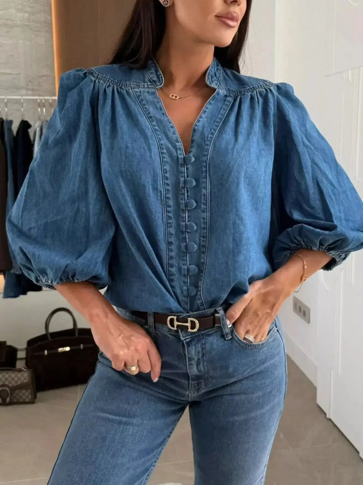 Women’s blue denim button-down blouse with puff sleeves, structured casual chic style from Plush Fashion Hub.