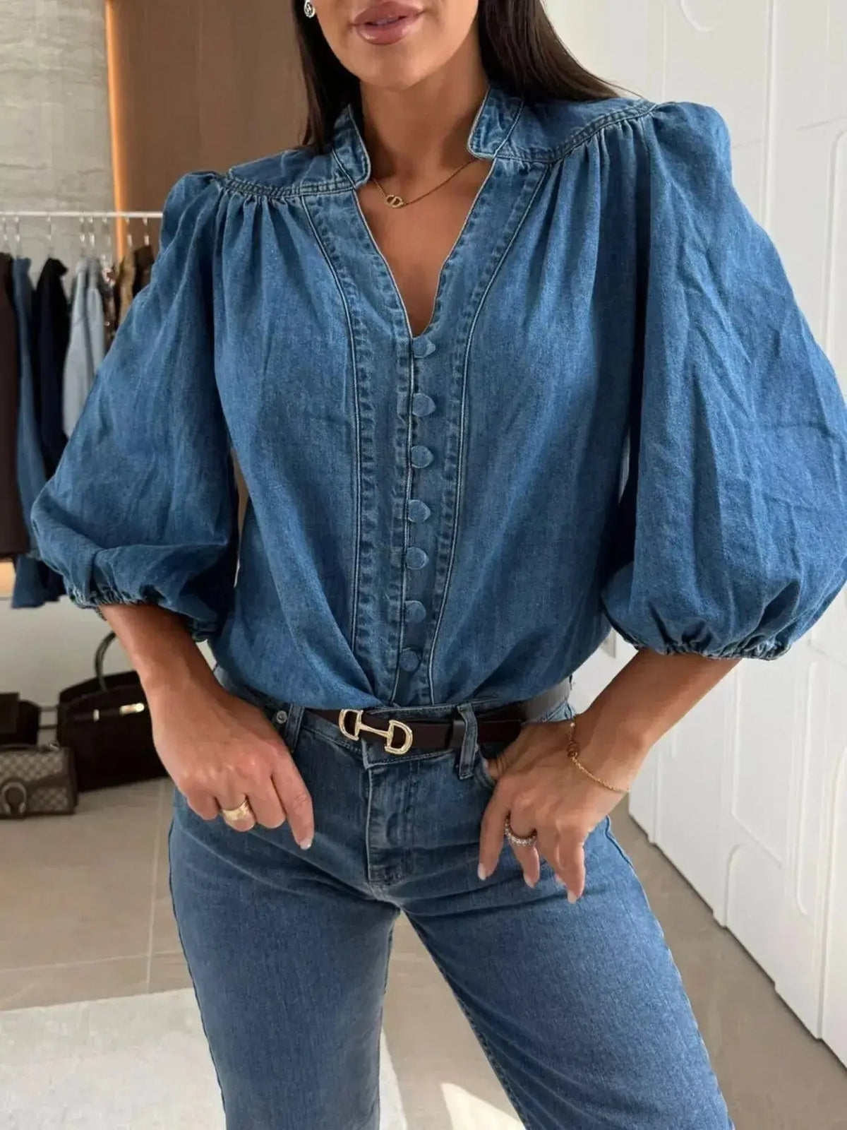 Women’s blue denim button-down blouse with puff sleeves, structured fit, casual chic style by Plush Fashion Hub.