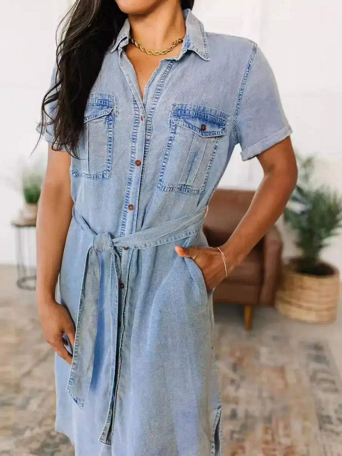 Women’s short sleeve belted denim dress by Plush Fashion Hub with button front and cotton blend fabric.