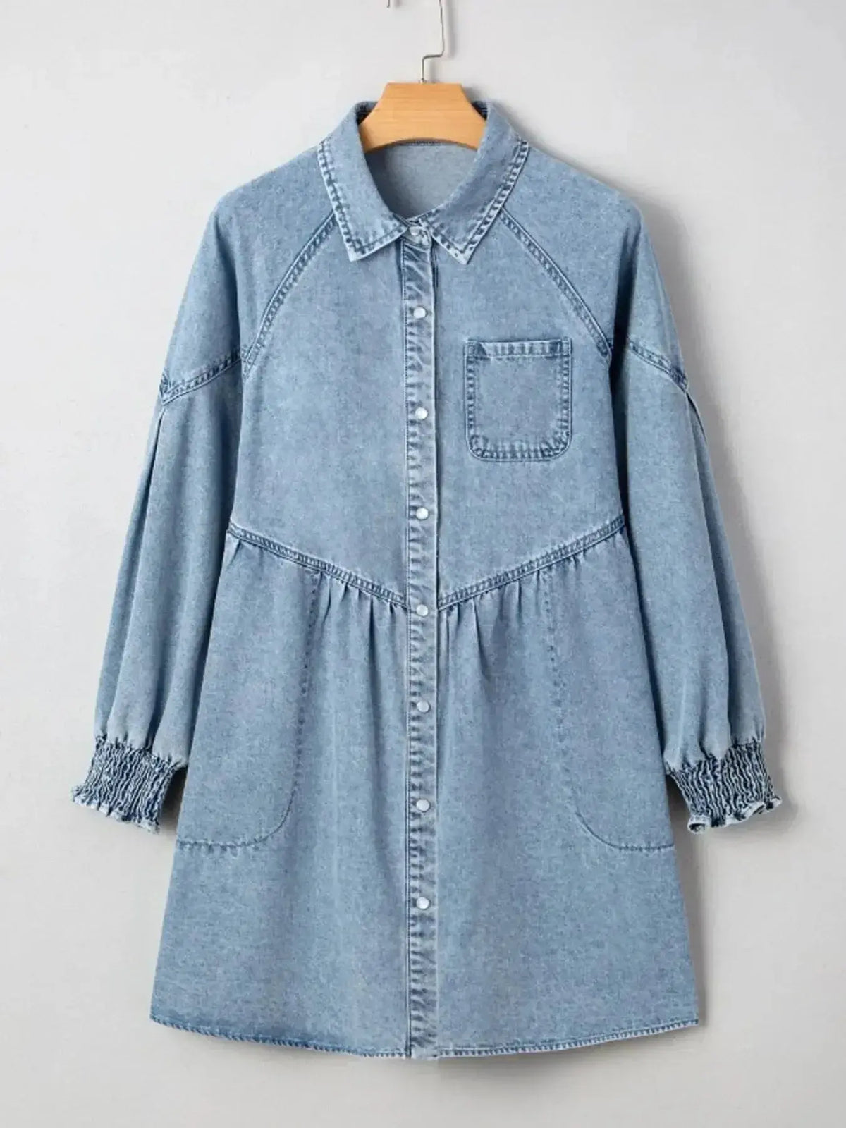 Women’s casual denim shirt dress with button-up front and smocked cuffs, stylish and comfortable from Plush Fashion Hub.