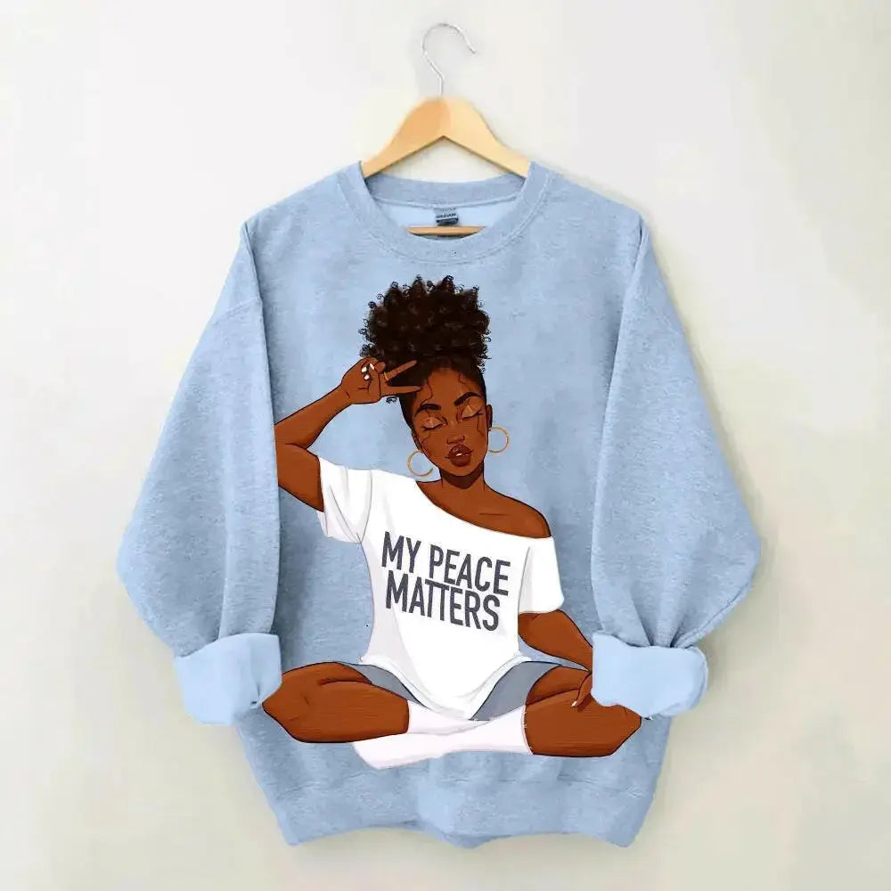 Women’s casual loose graphic print hoodie by Plush Fashion Hub, oversized plus size pullover with colorful creative design.
