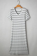 Women’s casual striped V-neck midi T-shirt dress by Trendsi, featuring comfortable fabric and a relaxed fit.