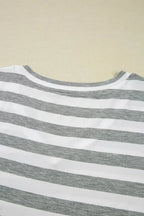 Women’s casual striped V-neck midi T-shirt dress by Trendsi, featuring a relaxed fit and comfortable fabric, styled for everyday wear.