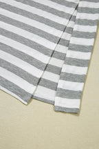 Women’s casual striped V-neck midi T-shirt dress by Trendsi, featuring a comfortable fit and stylish design.
