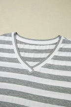 Women's casual striped V-neck midi T-shirt dress by Trendsi, featuring a comfortable fit and stylish design in soft fabric.
