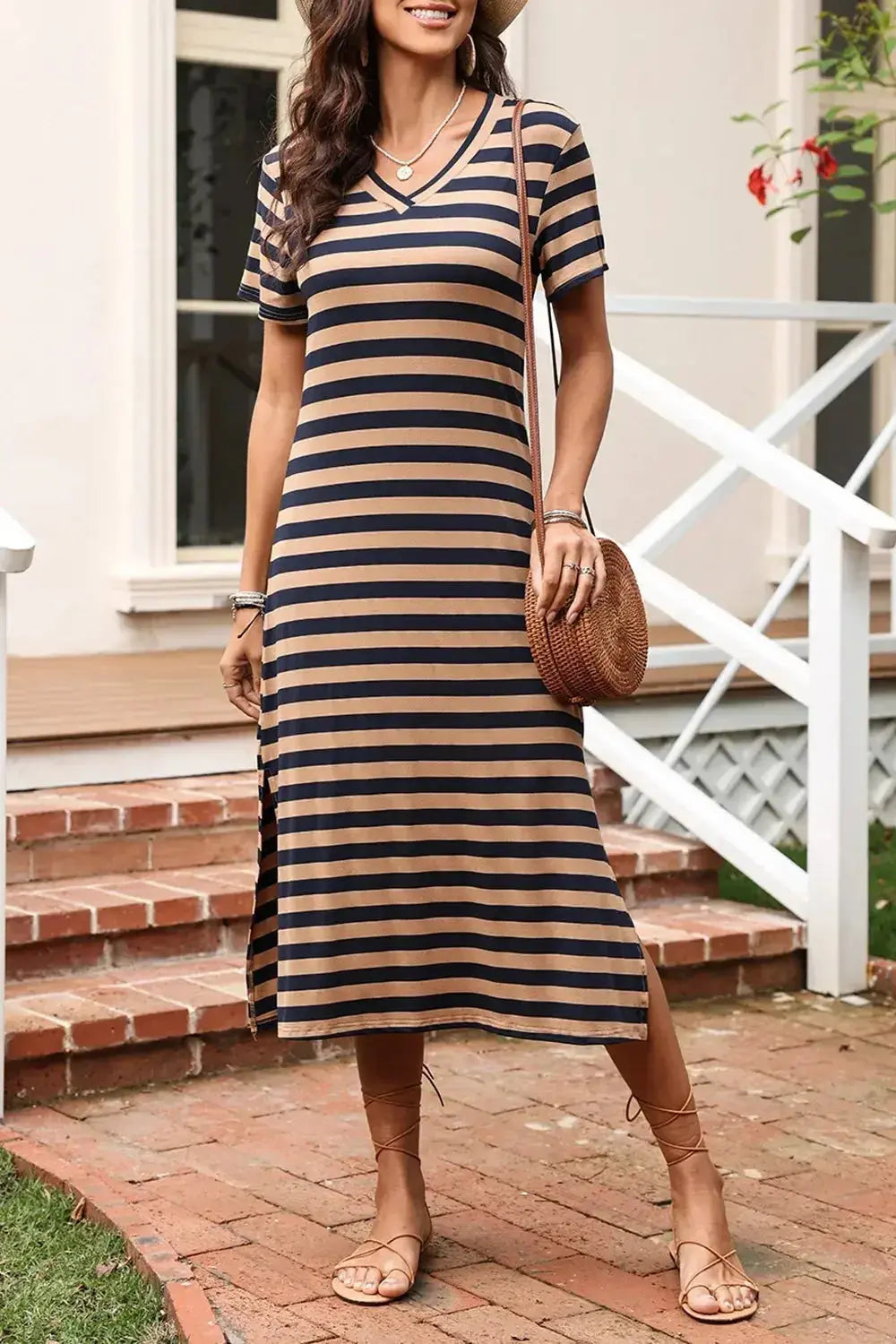 Women’s casual striped V-neck midi T-shirt dress by Trendsi, featuring a relaxed fit and comfortable fabric, perfect for everyday wear.
