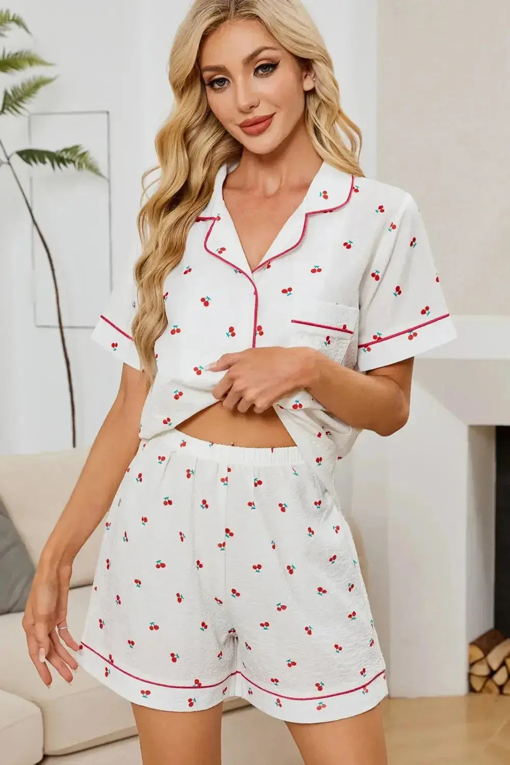 Women's cheery print collared pajama top and shorts lounge set by Plush Fashion Hub, featuring a button-down design and comfortable fit.