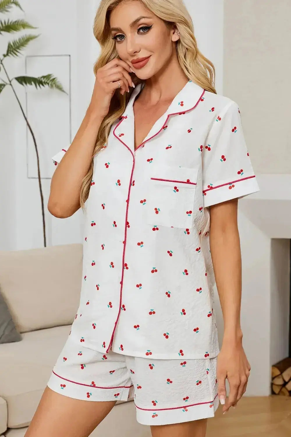 Women’s cheery print pajama set with collared button-down top and matching shorts from Plush Fashion Hub, cozy lounge wear for women.