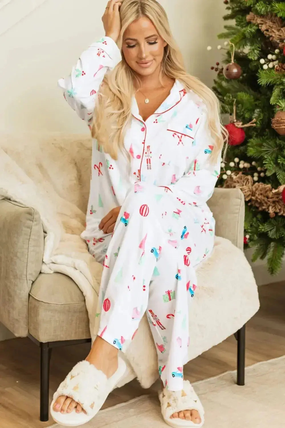 Women's Christmas print long sleeve collared pajama lounge set by Trendsi, featuring festive holiday-themed design and comfortable fabric.