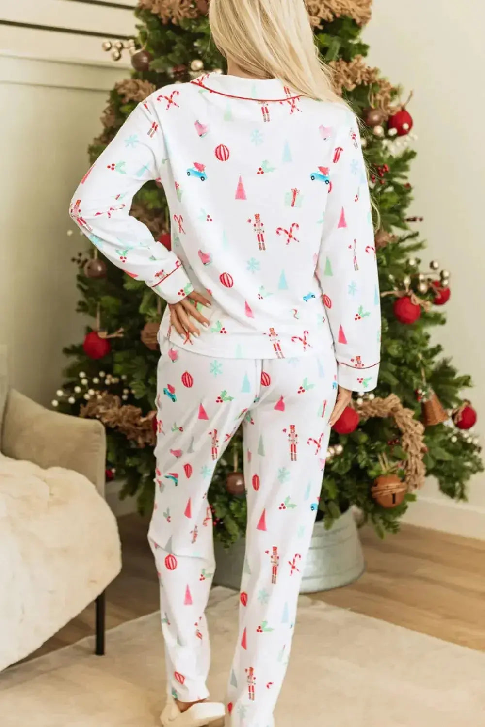 Women's Christmas print long sleeve collared pajama lounge set by Trendsi, featuring festive holiday design and comfortable fabric.