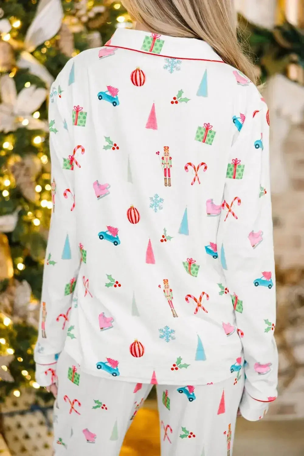 Women’s Christmas print long sleeve collared pajama lounge set by Trendsi, featuring festive holiday design and comfortable fabric.
